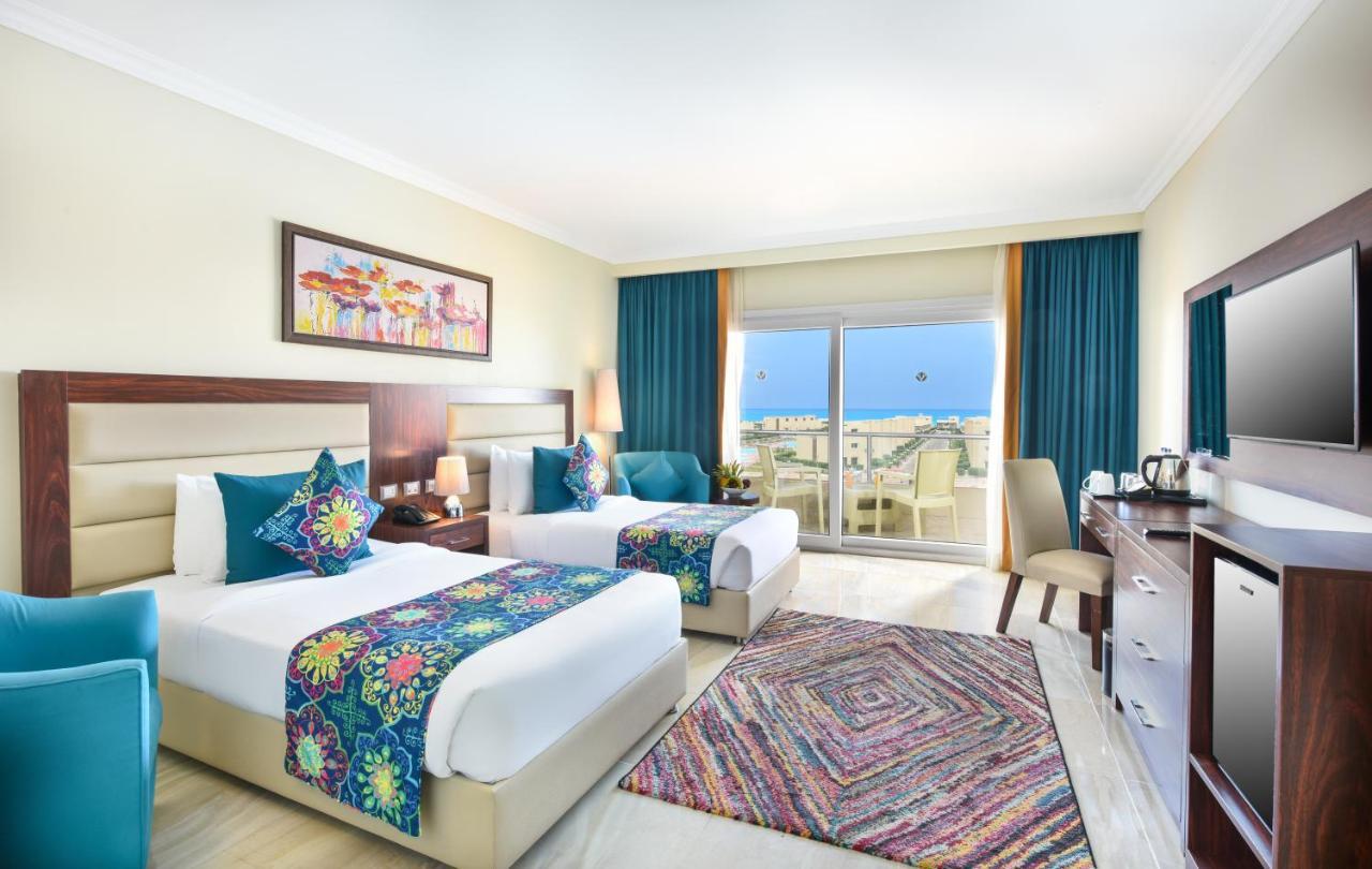 אל עלמיין Tolip North Coast Hotel מראה חיצוני תמונה A room at the hotel