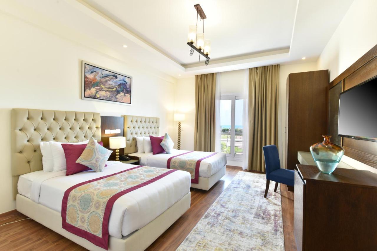 אל עלמיין Tolip North Coast Hotel מראה חיצוני תמונה Deluxe Room