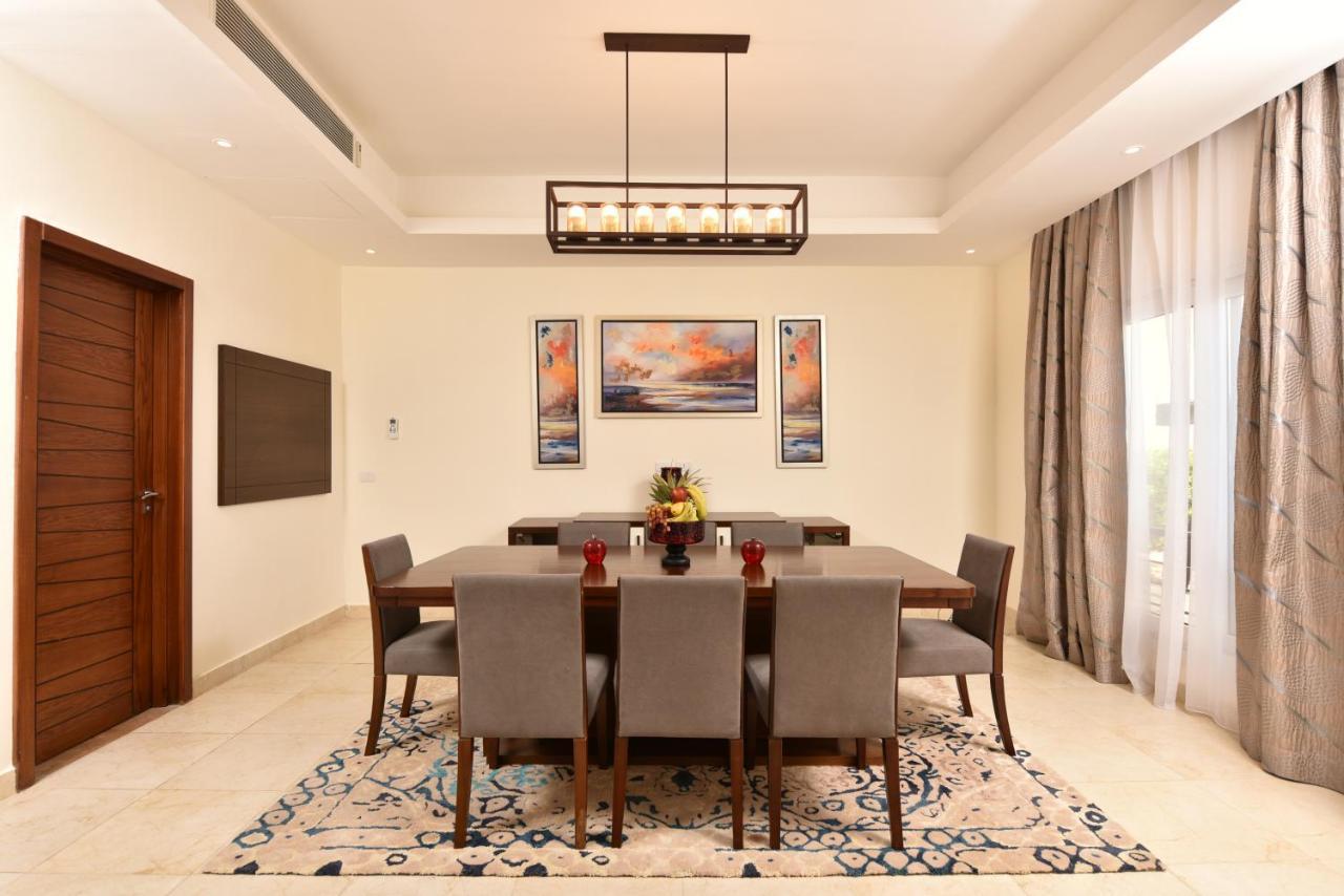 אל עלמיין Tolip North Coast Hotel מראה חיצוני תמונה A dining room