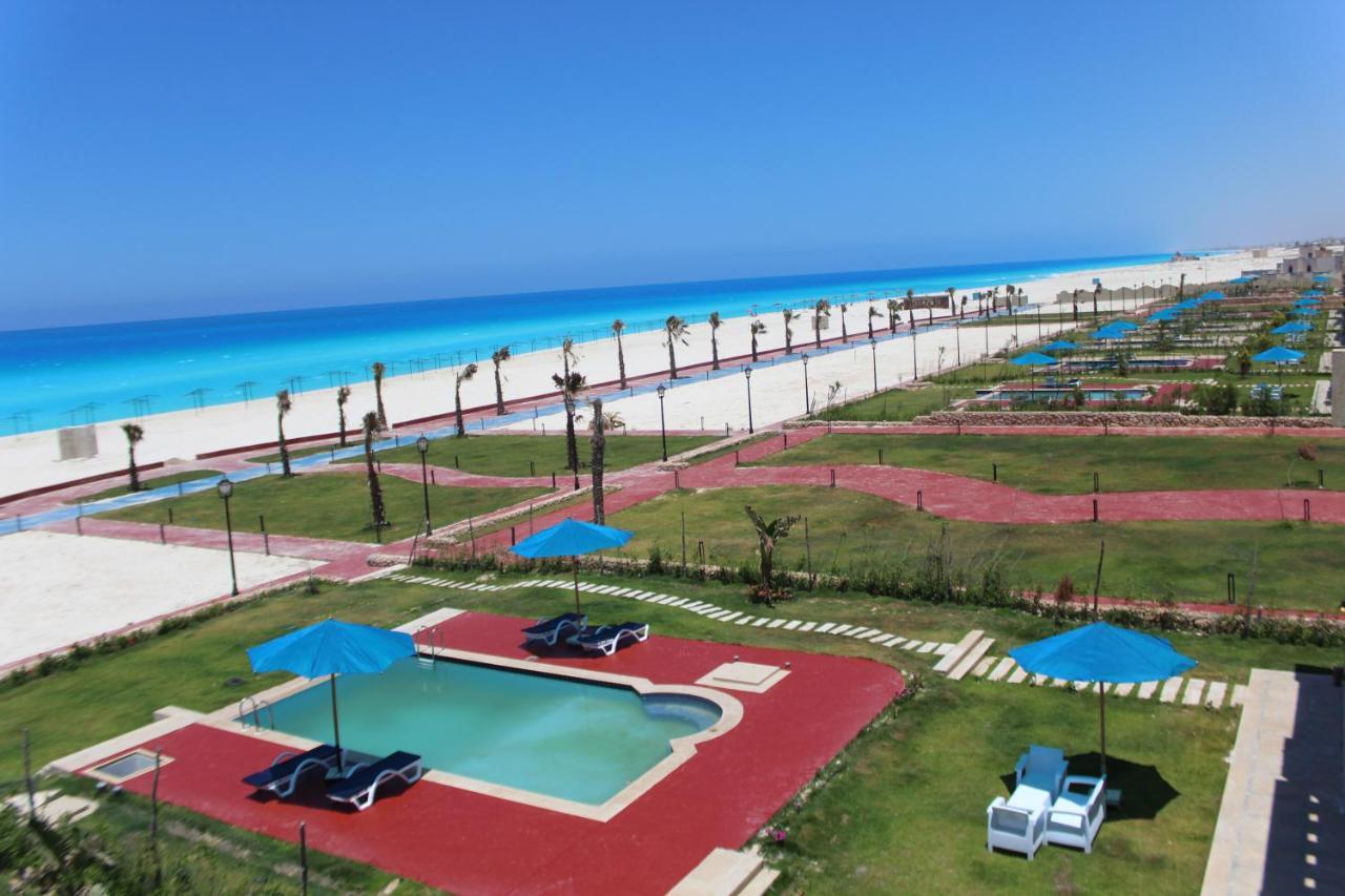 אל עלמיין Tolip North Coast Hotel מראה חיצוני תמונה El Alamein