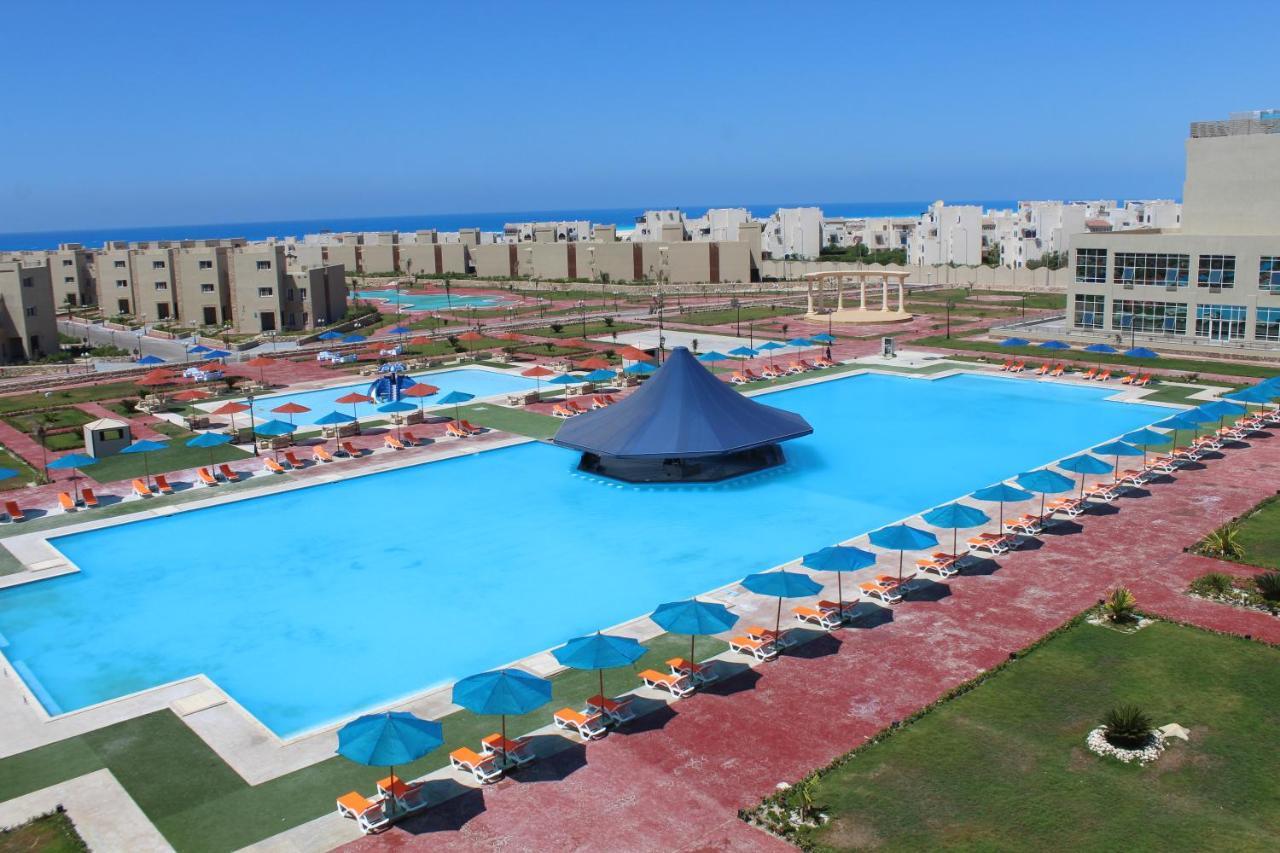 אל עלמיין Tolip North Coast Hotel מראה חיצוני תמונה El Alamein