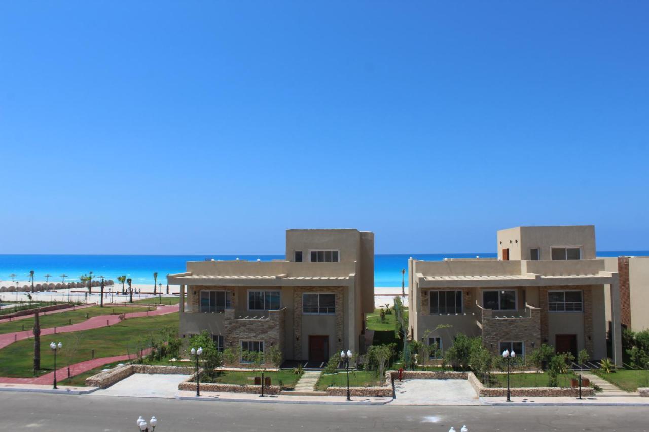 אל עלמיין Tolip North Coast Hotel מראה חיצוני תמונה Residential villas in El Alamein