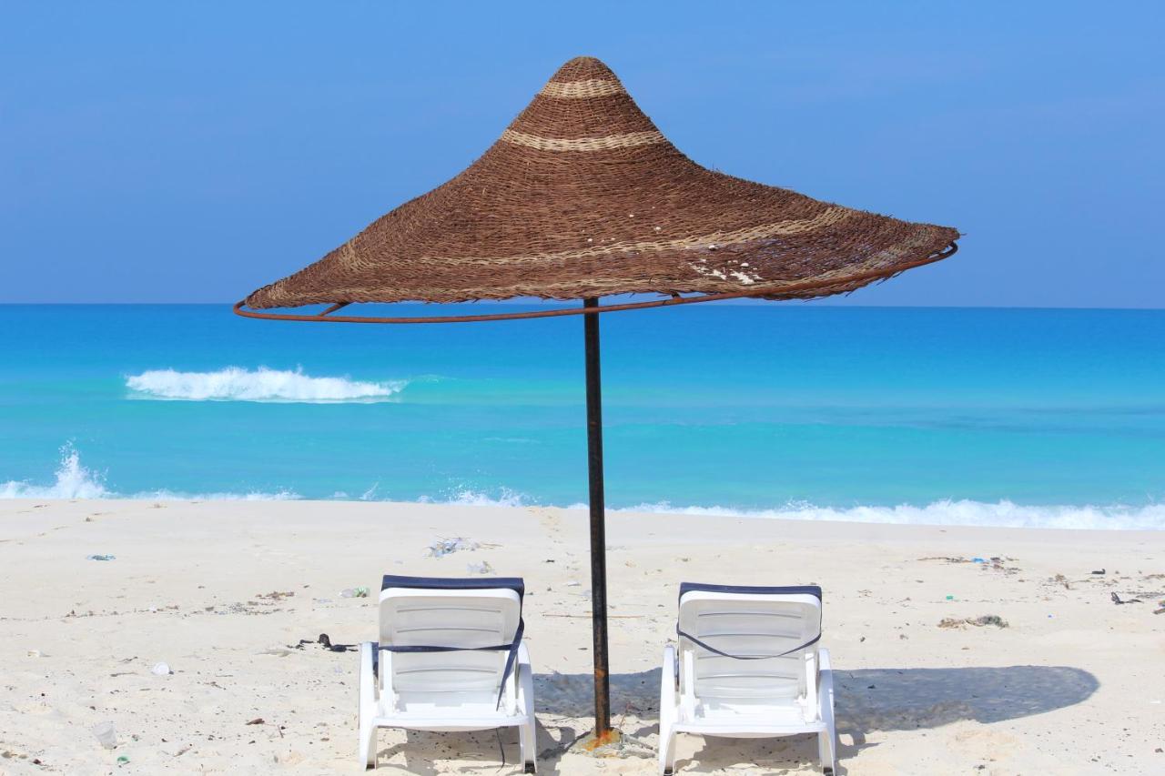 אל עלמיין Tolip North Coast Hotel מראה חיצוני תמונה Beach in El Alamein