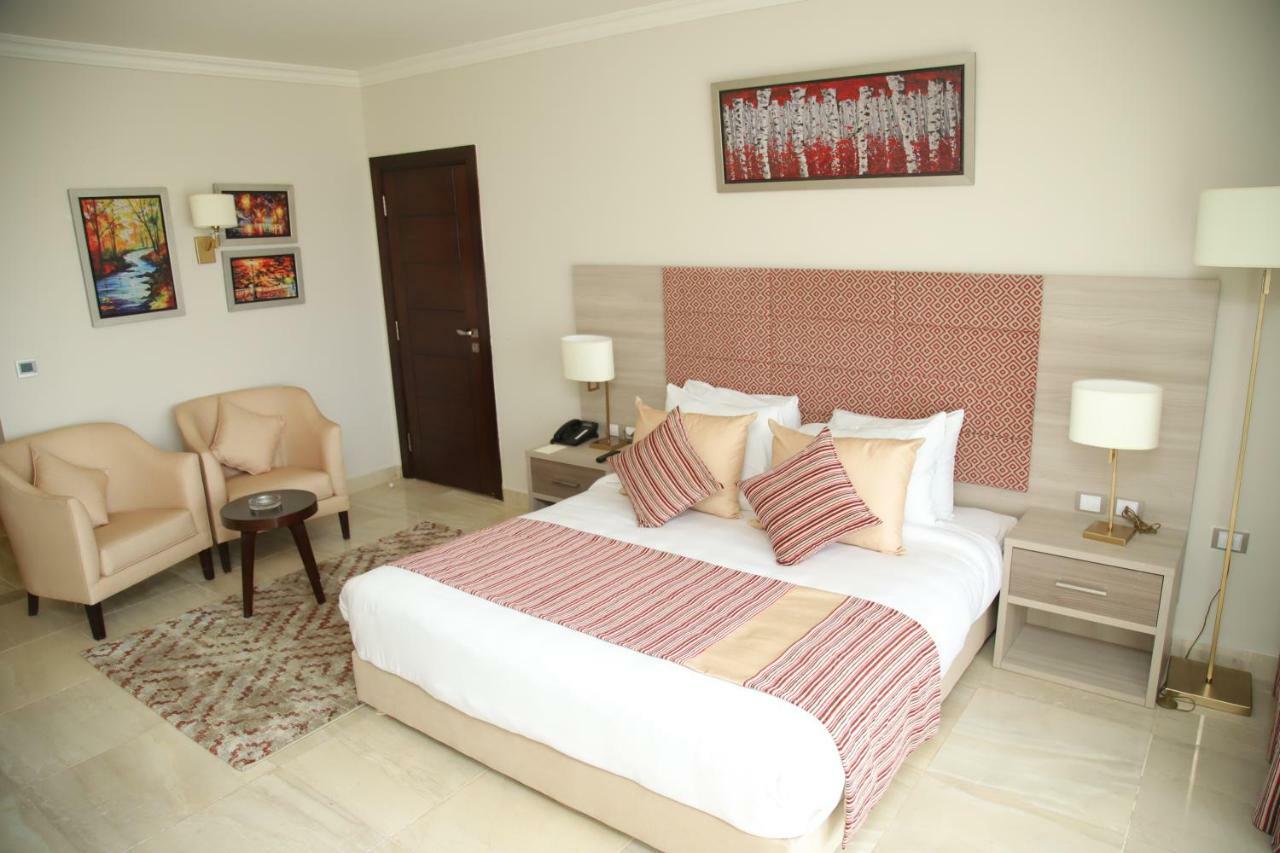 אל עלמיין Tolip North Coast Hotel מראה חיצוני תמונה A bedroom at the hotel